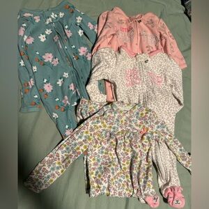Bundle of carters newborn sleepers. Little sister. Baby girl.